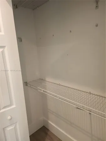 a view of small space with racks on the wall