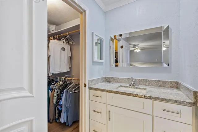 a bathroom with a sink double vanity and a mirror
