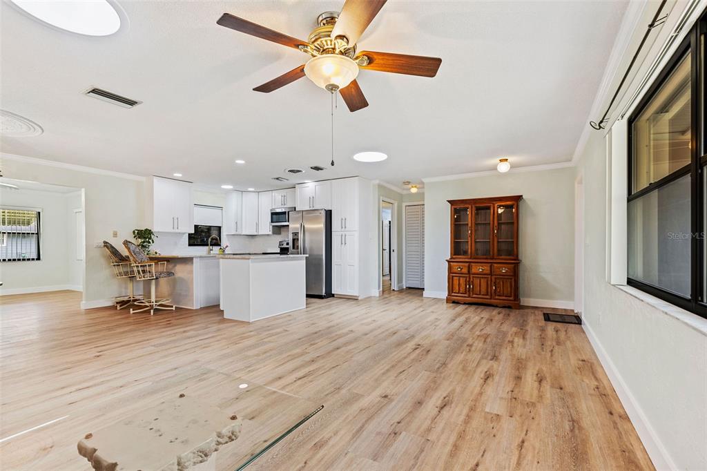 1855 Pine Tree Drive Edgewater, FL 32141 - Photo 6 of 26 a view of a kitchen with a sink and a microwave