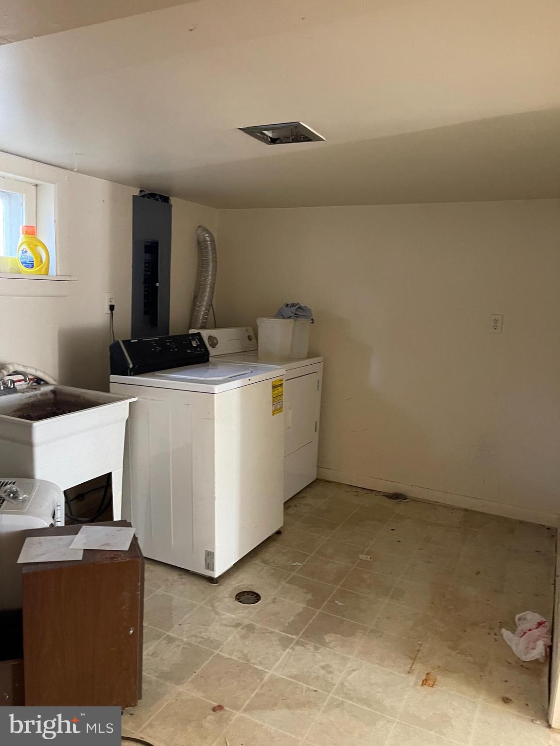 7968 Telegraph Road Severn, MD 21144 - Photo 22 of 26 a utility room with dryer and washer