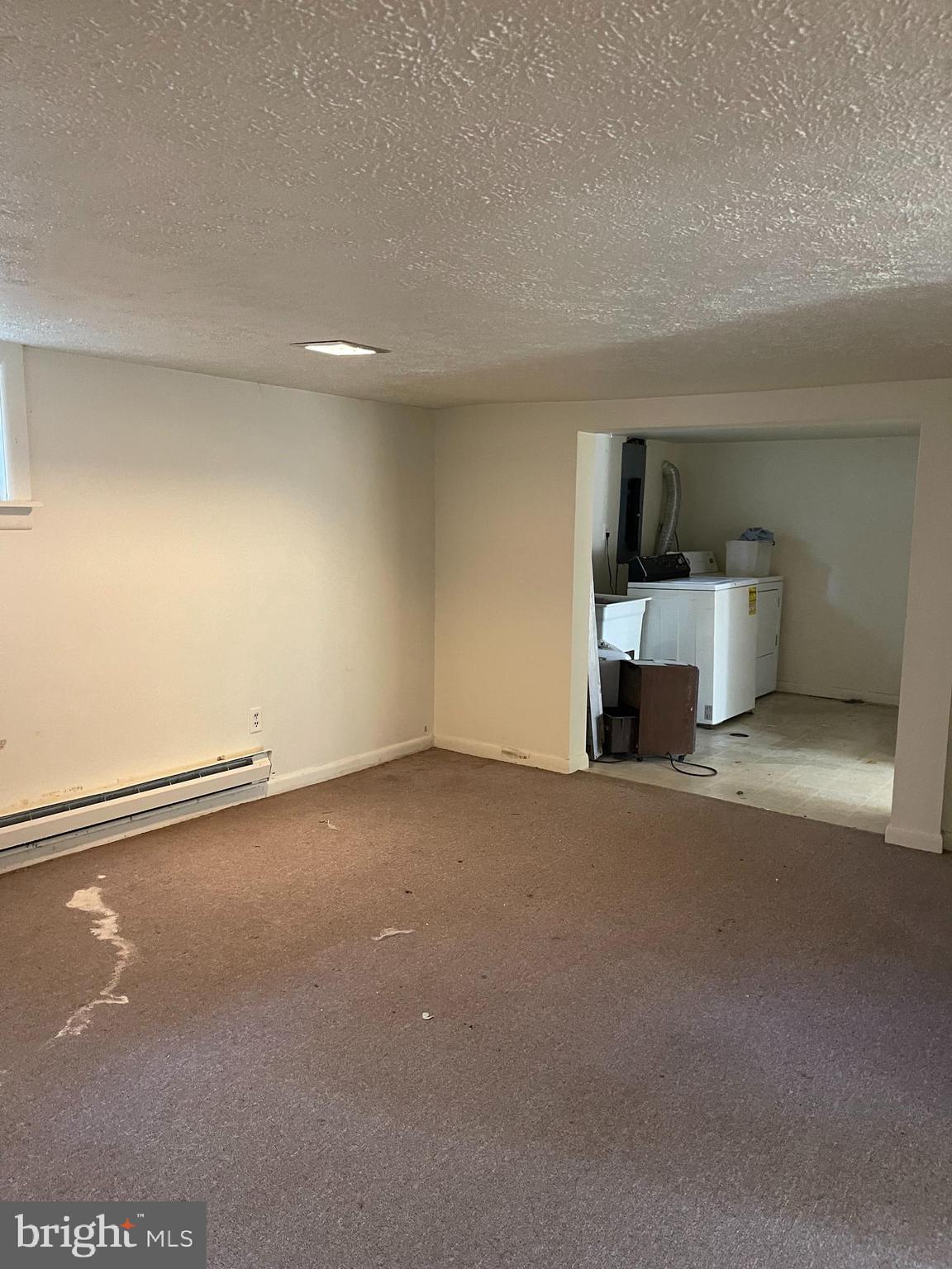 7968 Telegraph Road Severn, MD 21144 - Photo 23 of 26 a view of a room with a bench and a sink