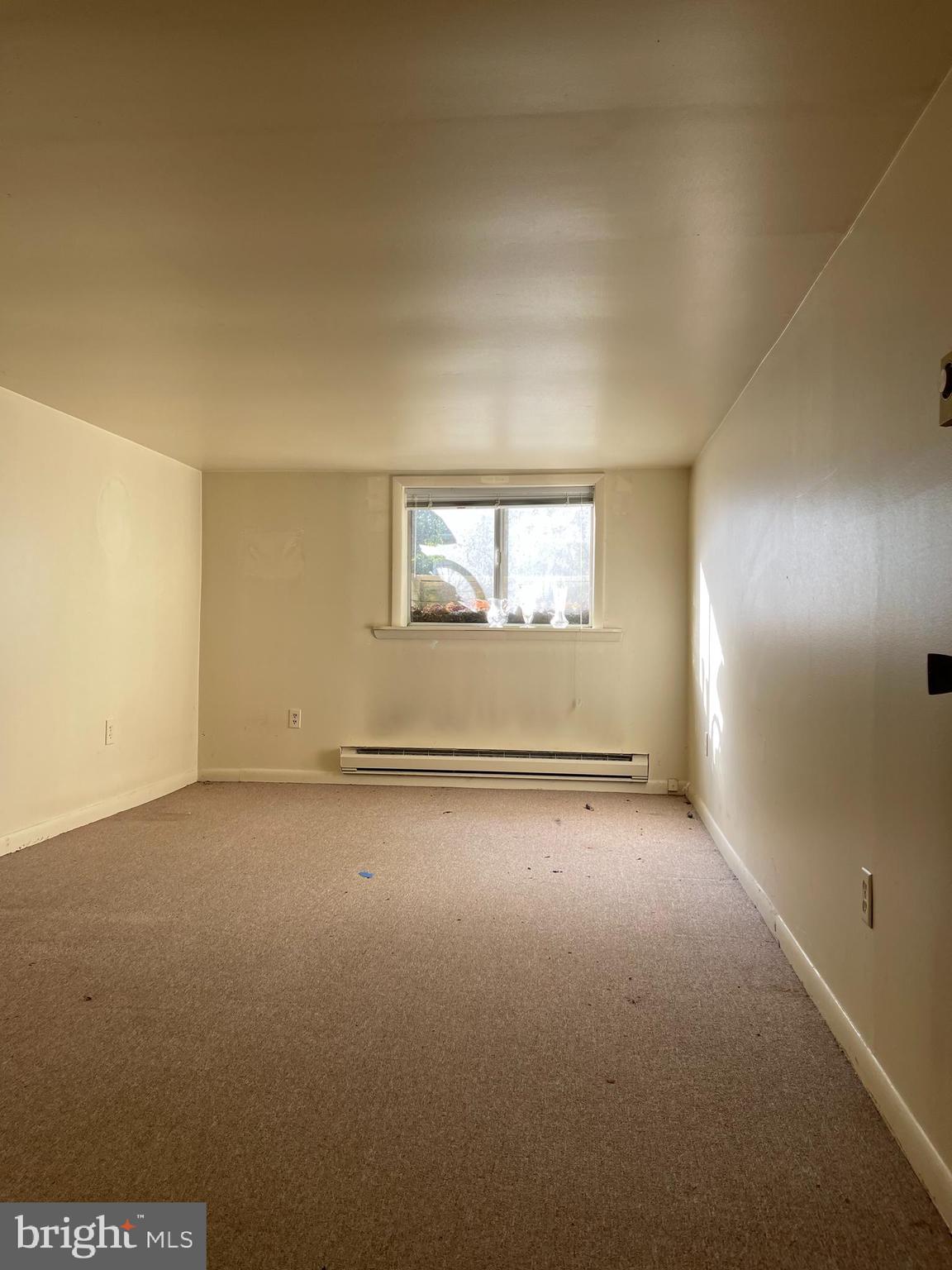 7968 Telegraph Road Severn, MD 21144 - Photo 24 of 26 an empty room with a empty space and windows