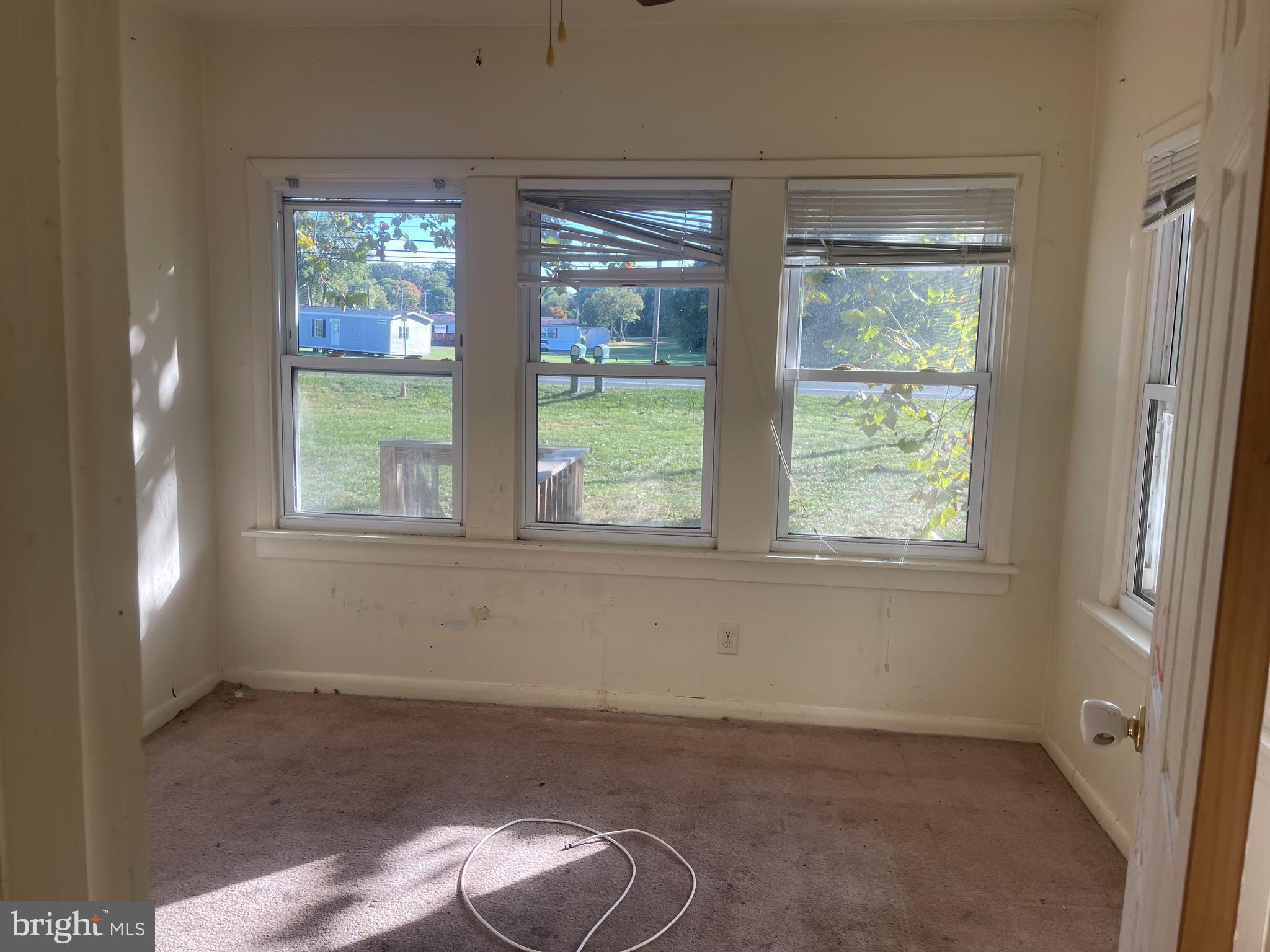 7968 Telegraph Road Severn, MD 21144 - Photo 7 of 26 a view of empty room with window