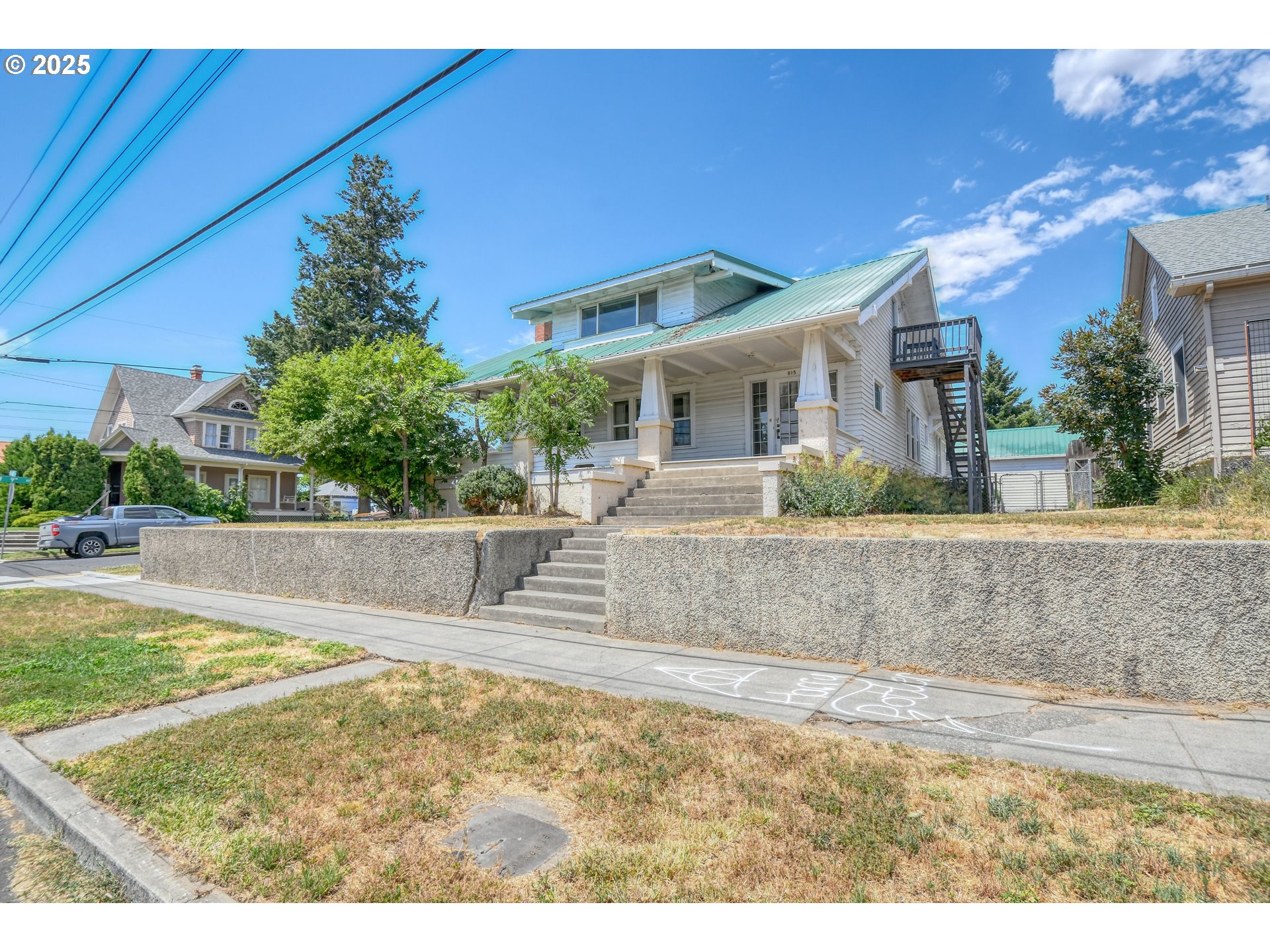 a view of house with outdoor space