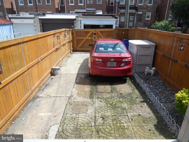 a view of a patio with swimming pool