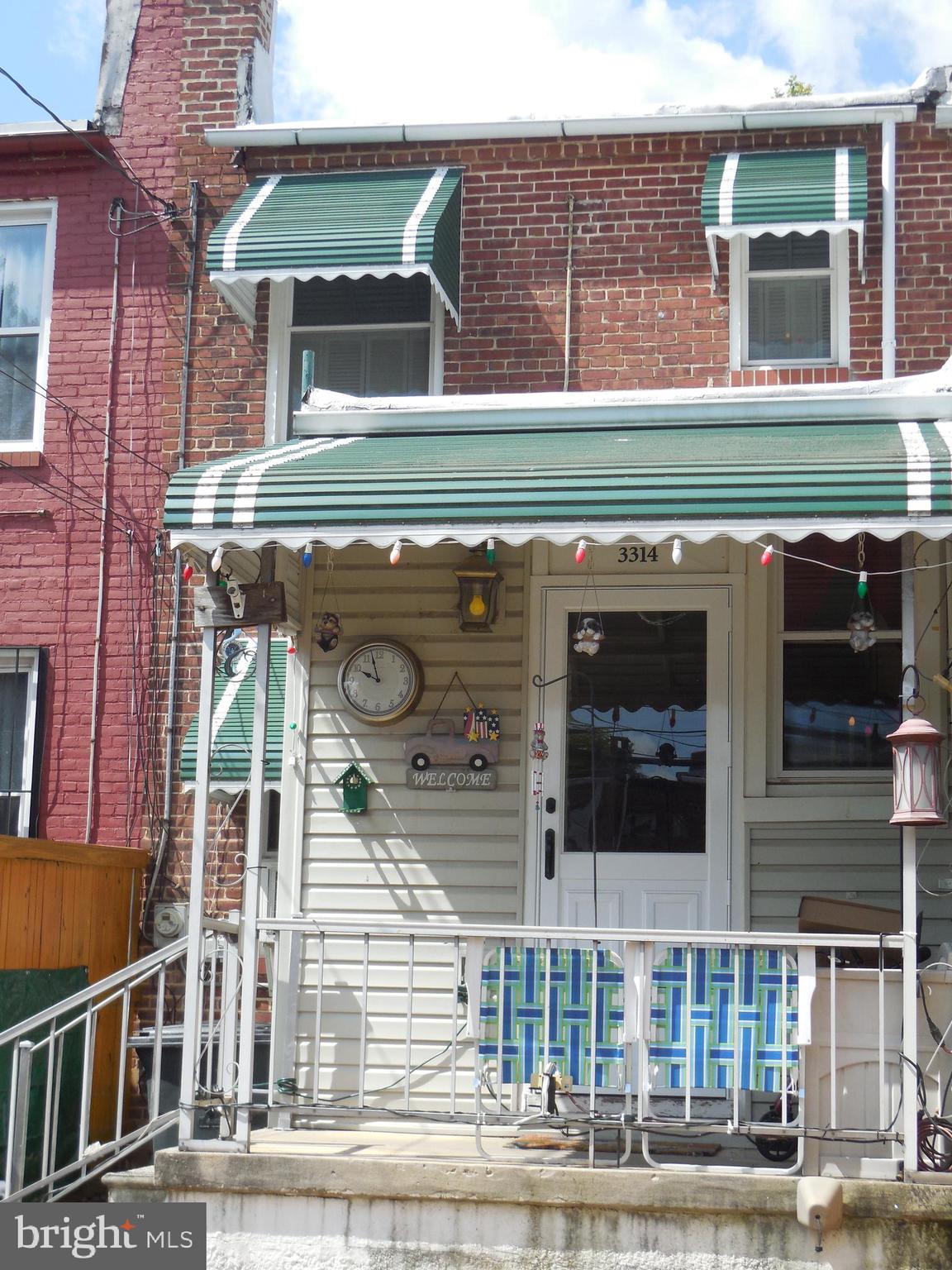 3314 Kenyon Avenue Baltimore, MD 21213 - Photo 20 of 21 a front view of a house