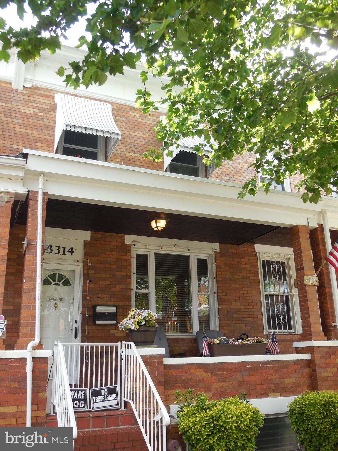 3314 Kenyon Avenue Baltimore, MD 21213 - Photo 2 of 21 front view of house with a porch
