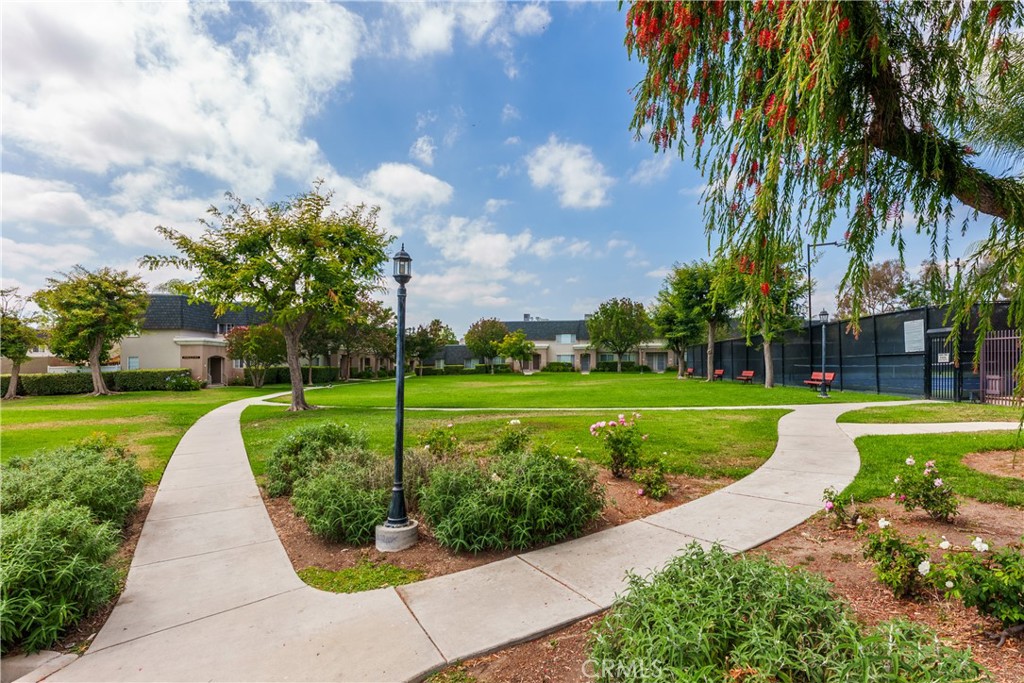 19111 Hamlin Street Reseda, CA 91335 - Photo 5 of 20 Complex with beautiful grounds. Tennis courts to the right.