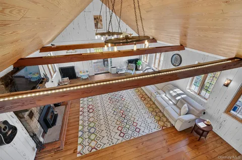a view of staircase with a rug