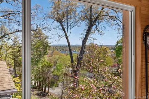a view of a tree in a mirror