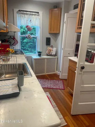 a view of living room with furniture and a large window