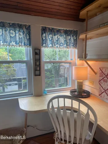 a view of a room with furniture window and outside view