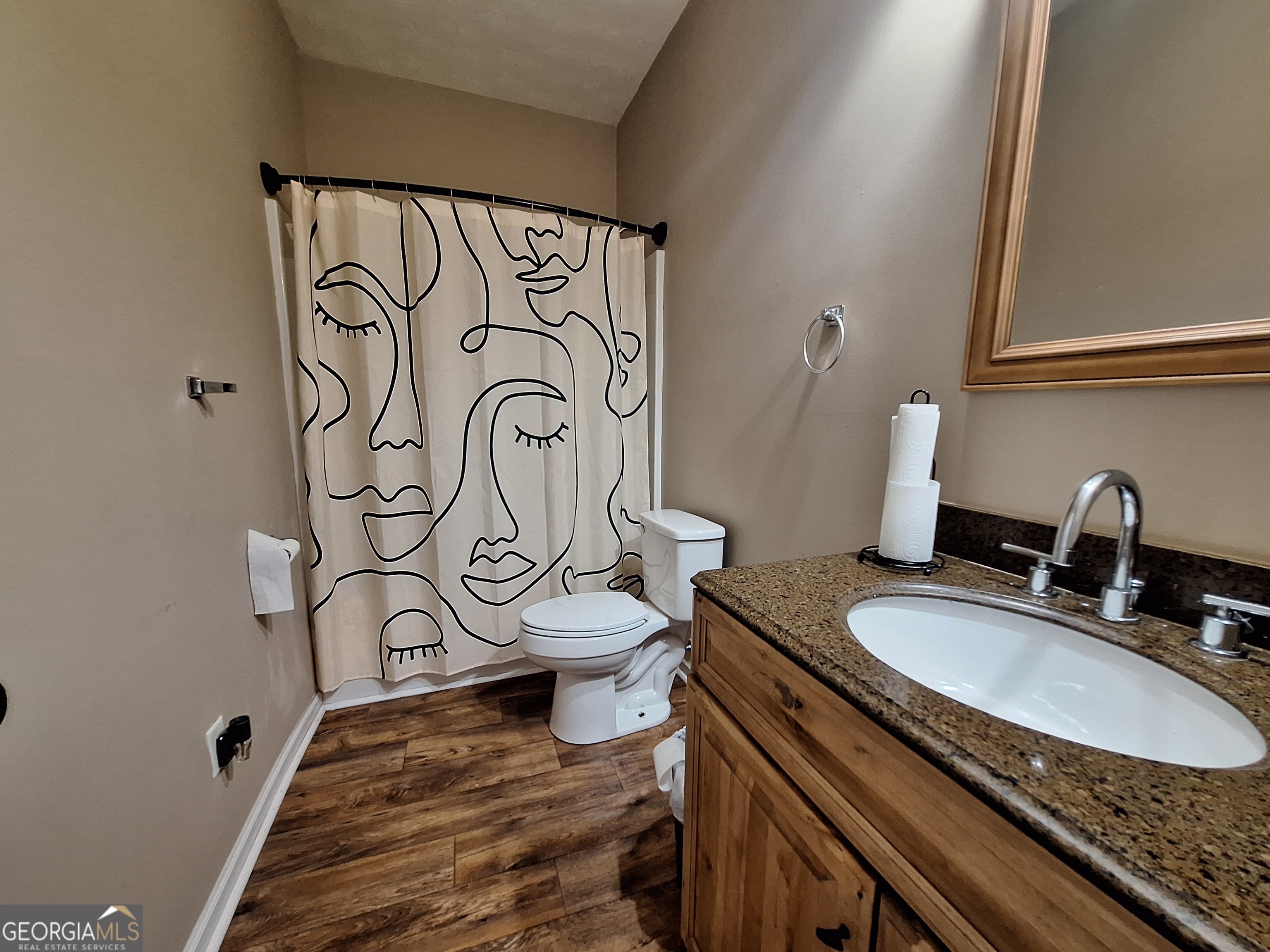 806 Springfield Drive Lafayette, AL 36862 - Photo 18 of 19 a bathroom with a granite countertop sink and a mirror