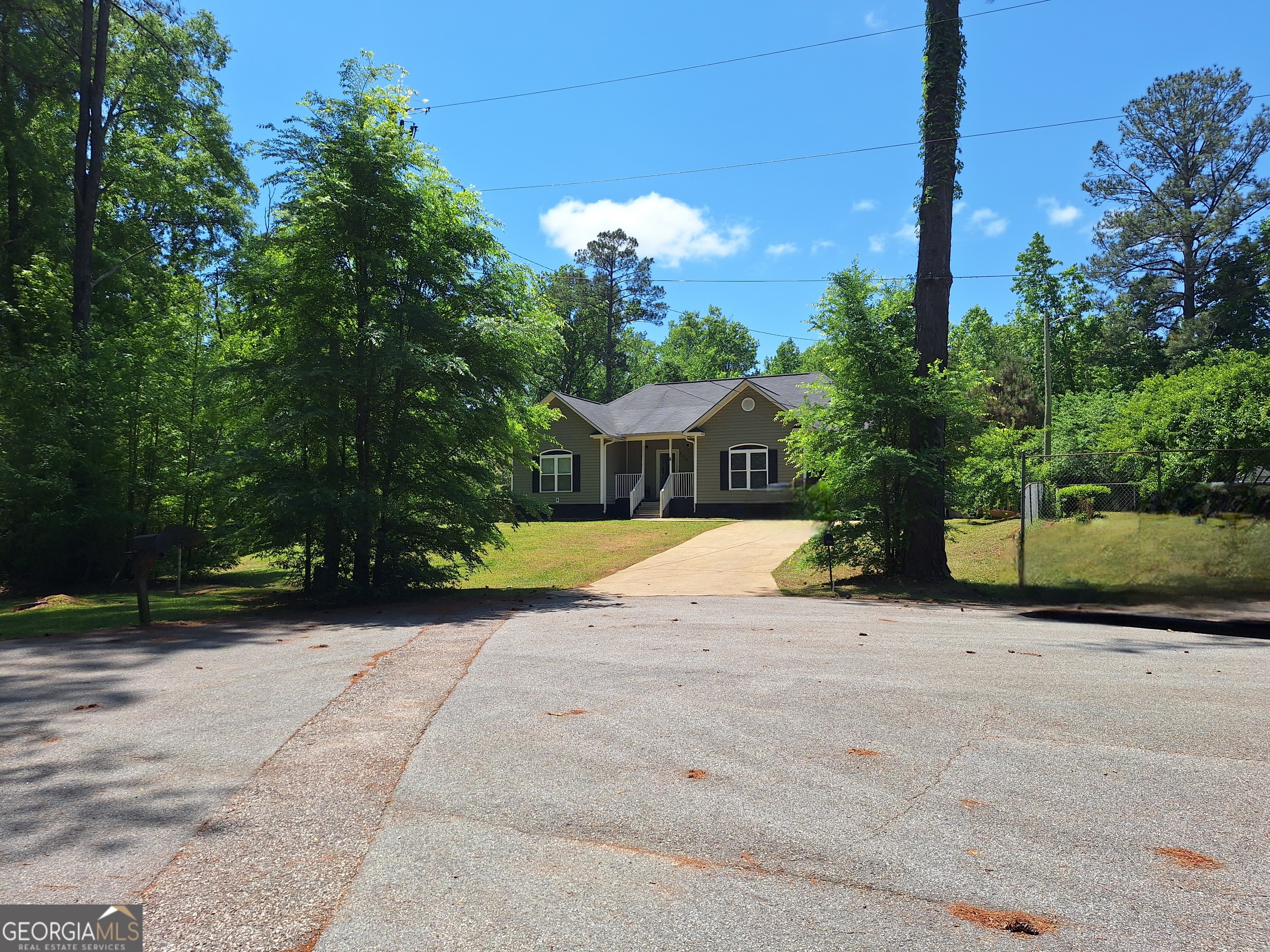 806 Springfield Drive Lafayette, AL 36862 - Photo 2 of 19 a view of a house with palm trees