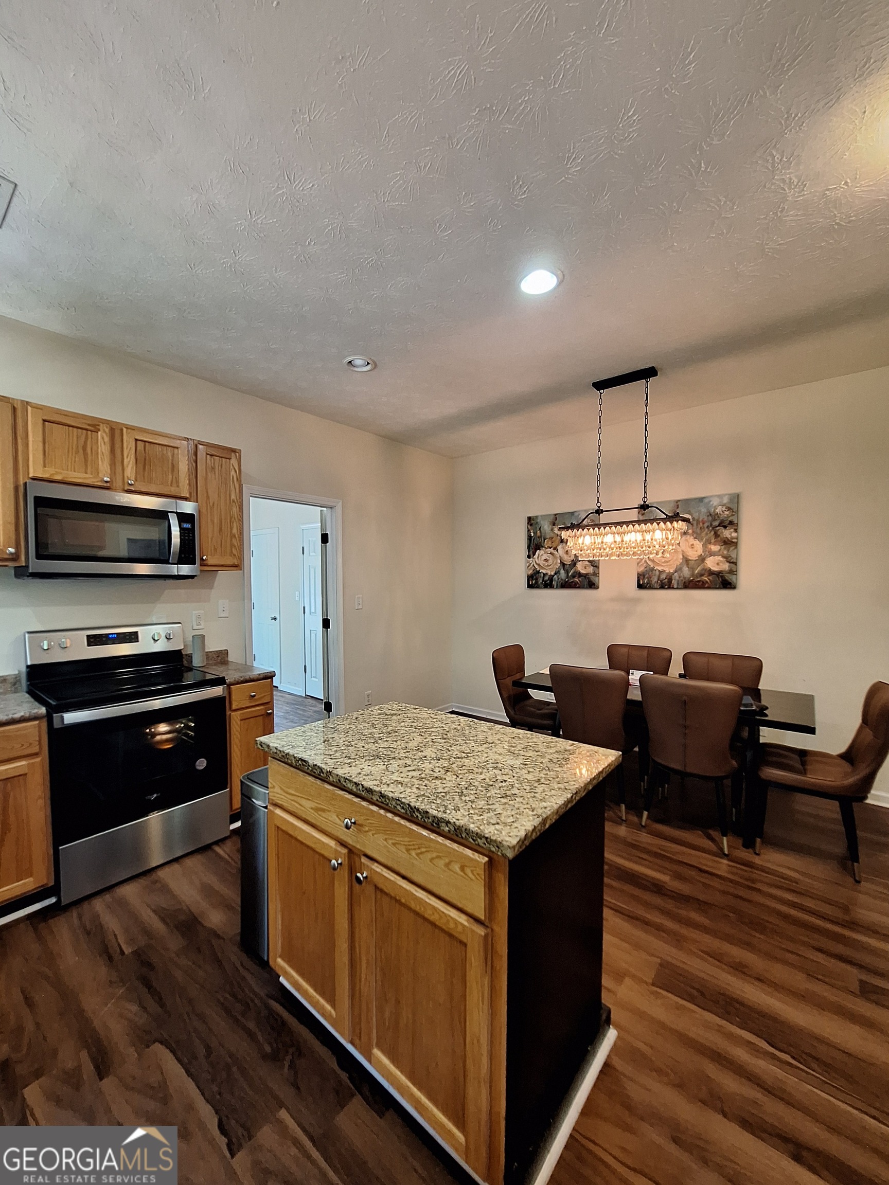 806 Springfield Drive Lafayette, AL 36862 - Photo 8 of 19 a kitchen with a stove a sink and a refrigerator