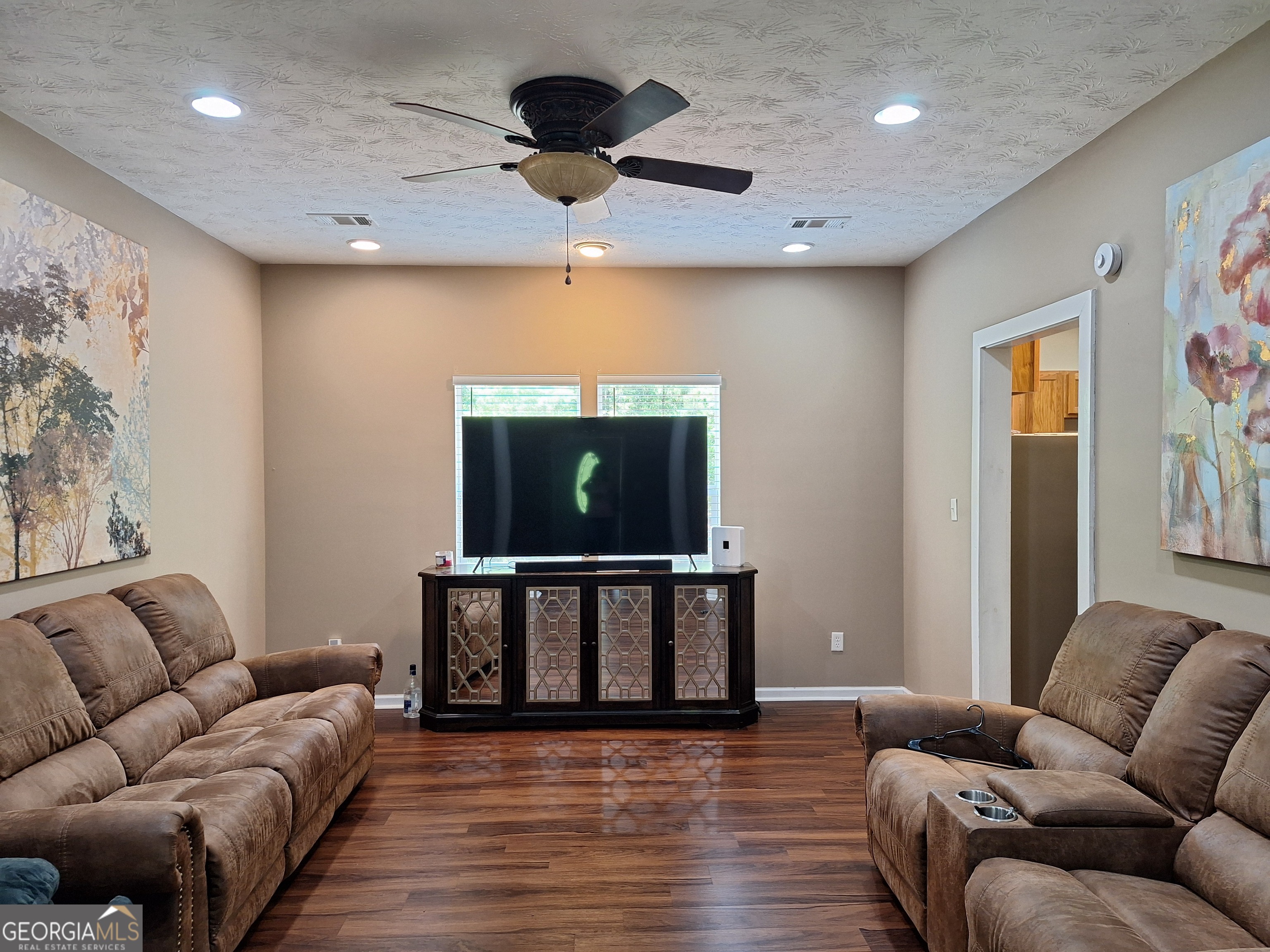 806 Springfield Drive Lafayette, AL 36862 - Photo 10 of 19 a living room with furniture and a flat screen tv