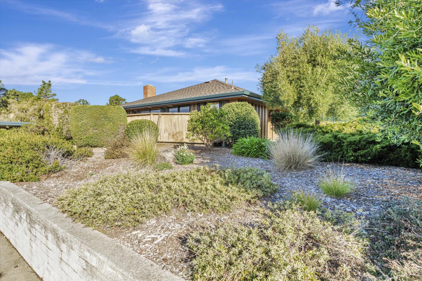 74 Del Mesa Carmel Carmel, CA 93923 - Photo 20 of 20 a backyard of a house with lots of green space