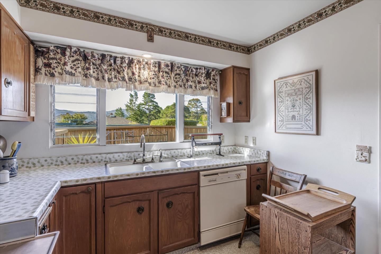 74 Del Mesa Carmel Carmel, CA 93923 - Photo 7 of 20 a kitchen with a sink and a window