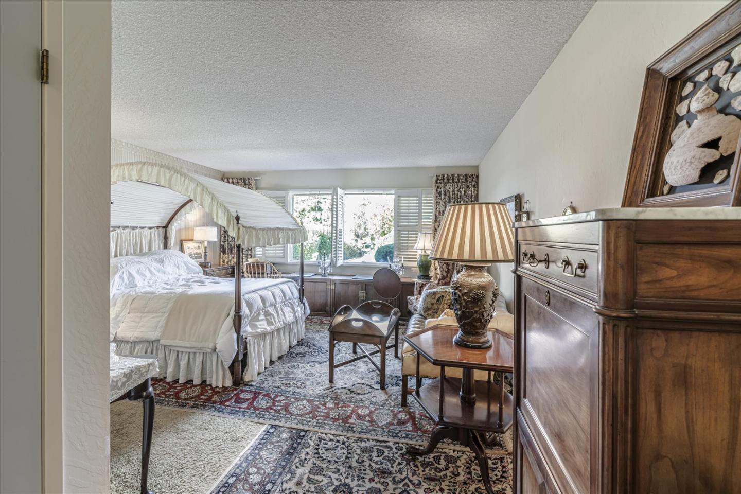 74 Del Mesa Carmel Carmel, CA 93923 - Photo 9 of 20 a living room with furniture and a fireplace