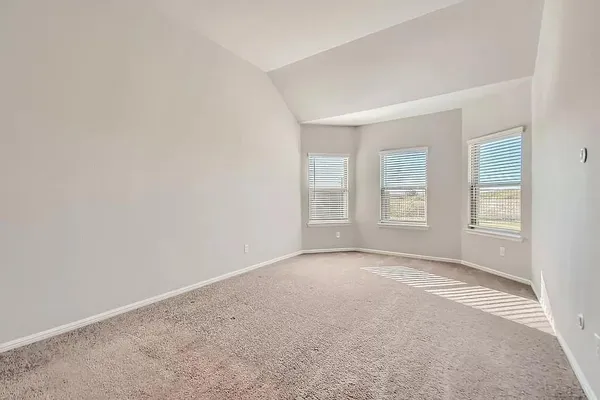 an empty room with windows