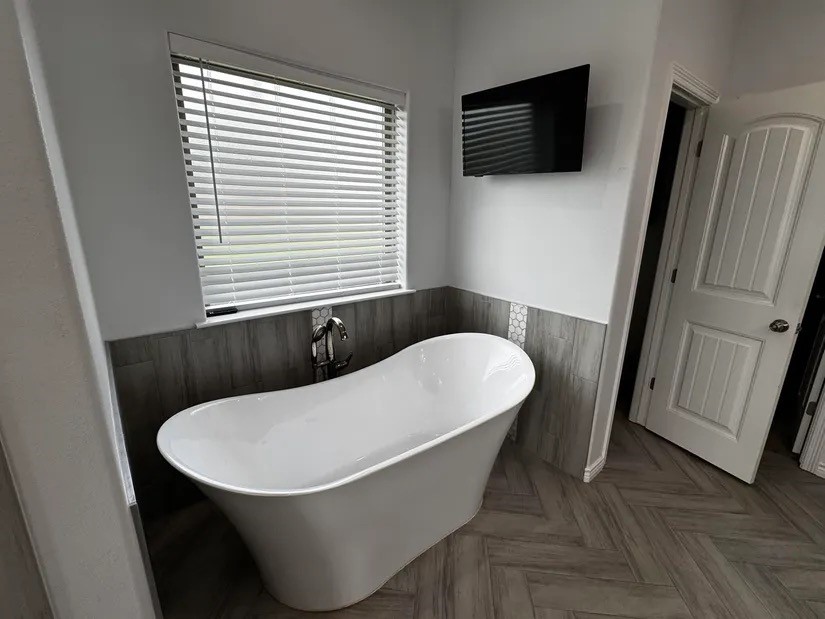 2295 Diamond D Lane Beaumont, TX 77713 - Photo 16 of 40 a bathroom with a sink and a mirror
