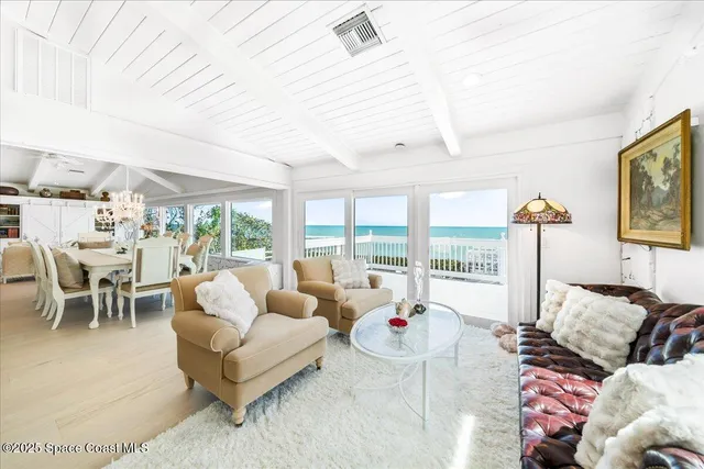a dining room with furniture and a fireplace