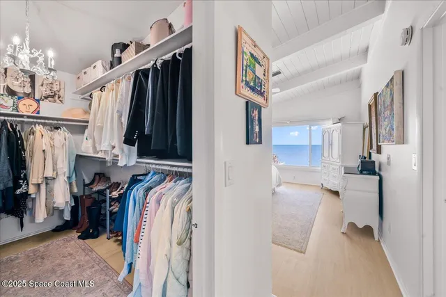 a swimming pool with outdoor seating and yard