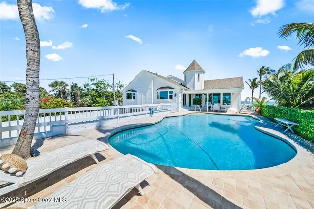 a view of a chairs and table in the terrace