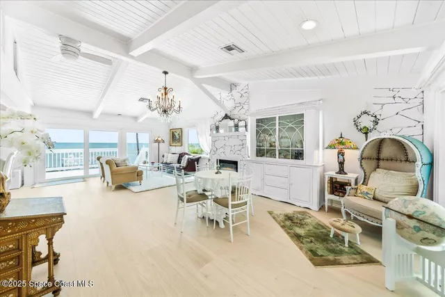 a kitchen with stainless steel appliances granite countertop a sink and a refrigerator