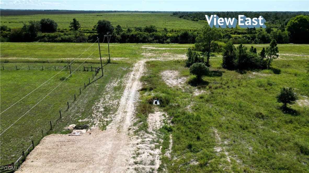 4th Terrace LaBelle, FL 33935 - Photo 3 of 6 a view of a field with grass