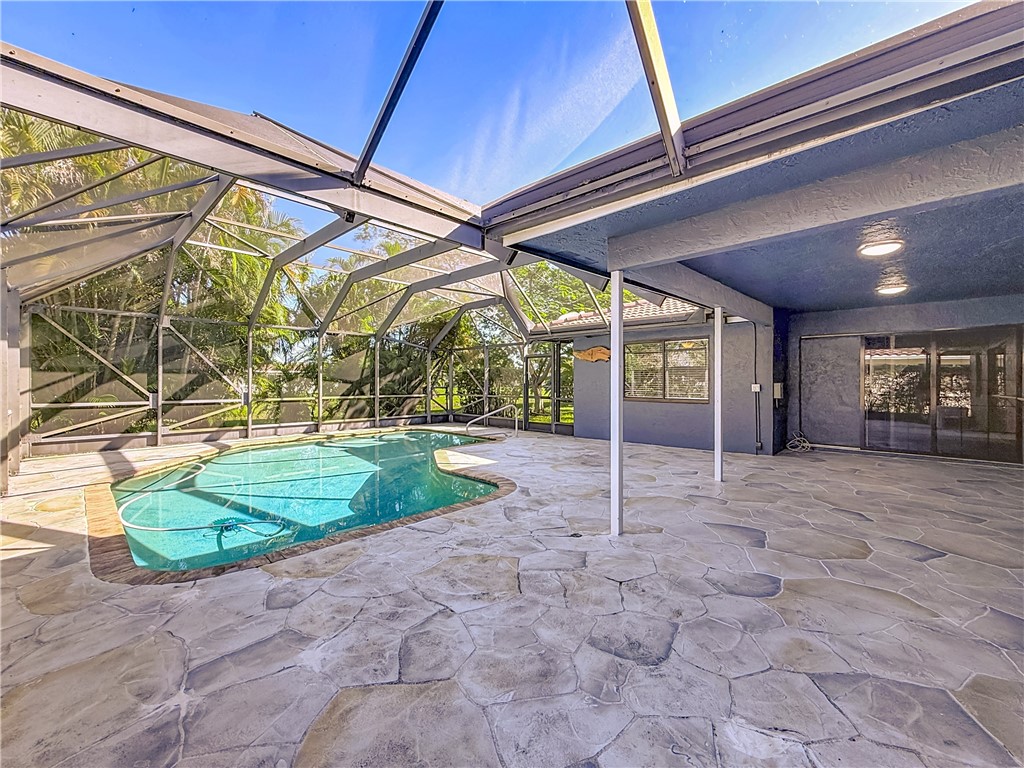 4667 Baldric Street Boca Raton, FL 33428 - Photo 29 of 32 a view of a backyard