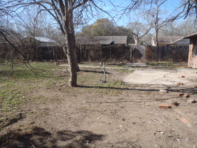 652 Fir Lane Lockhart, TX 78644 - Photo 8 of 26 a view of a house with a yard