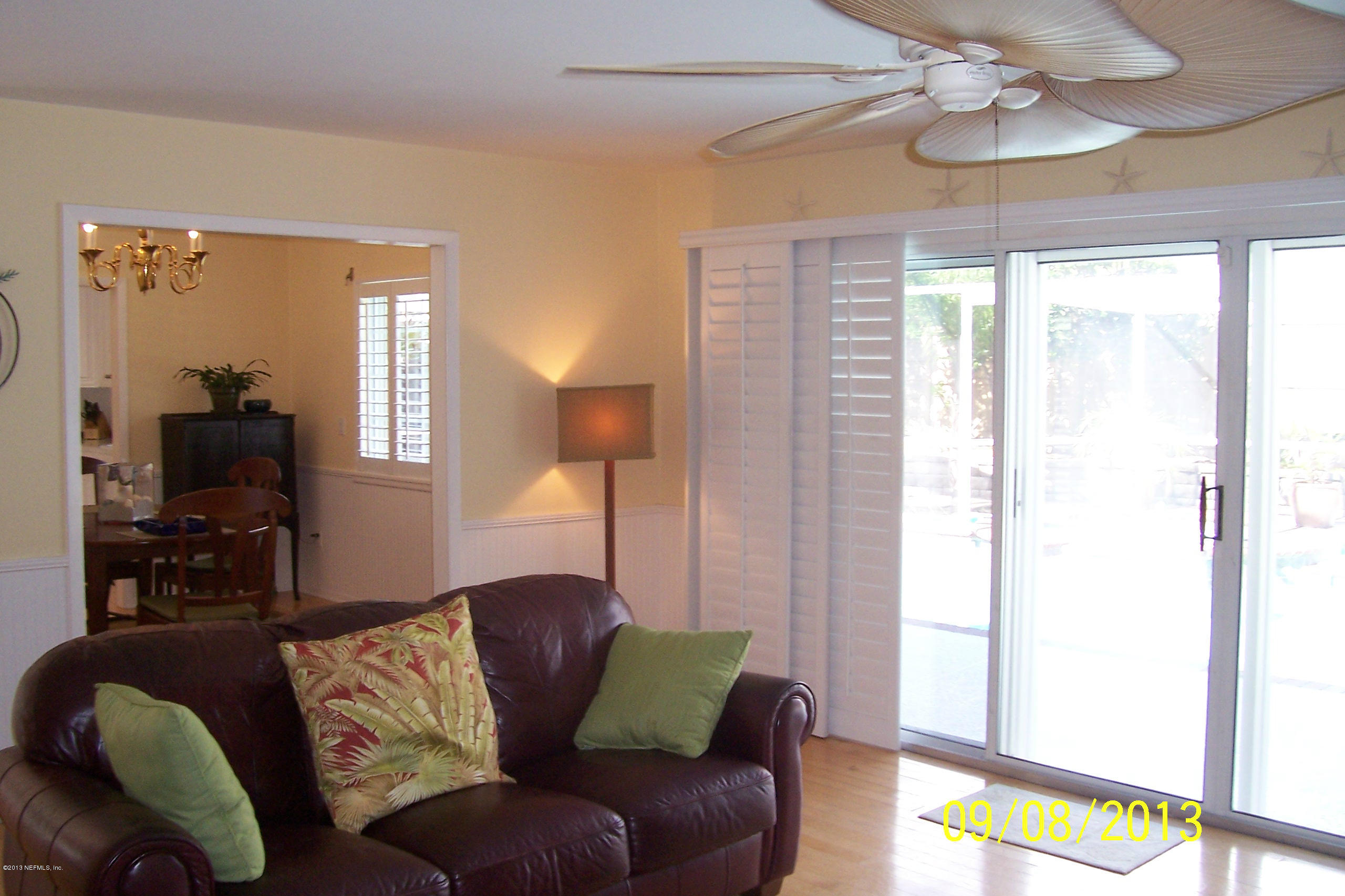 1854 Seminole Road Atlantic Beach, FL 32233 - Photo 12 of 33 a living room with furniture and a window
