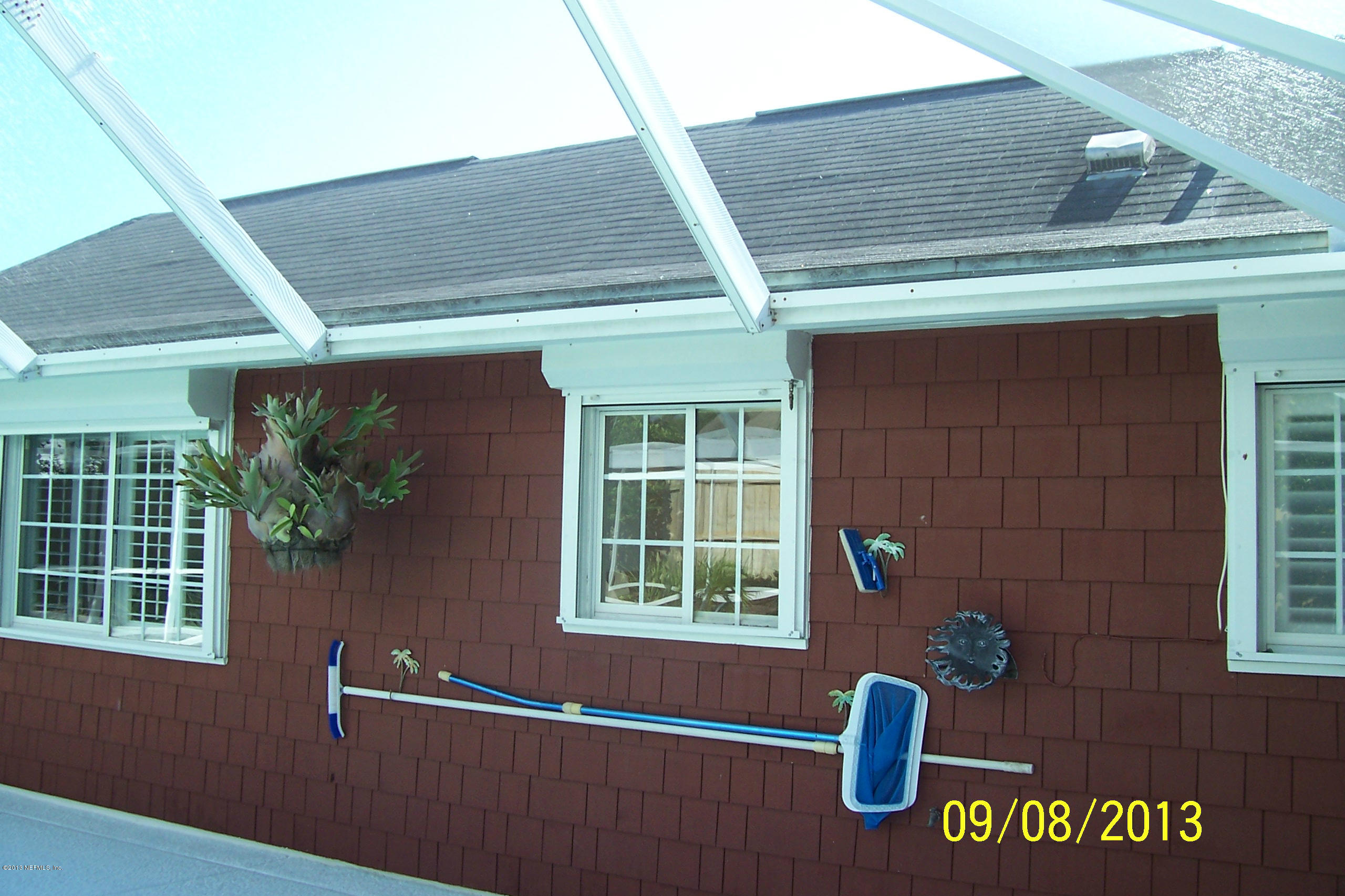 1854 Seminole Road Atlantic Beach, FL 32233 - Photo 16 of 33 a front view of a house with a yard