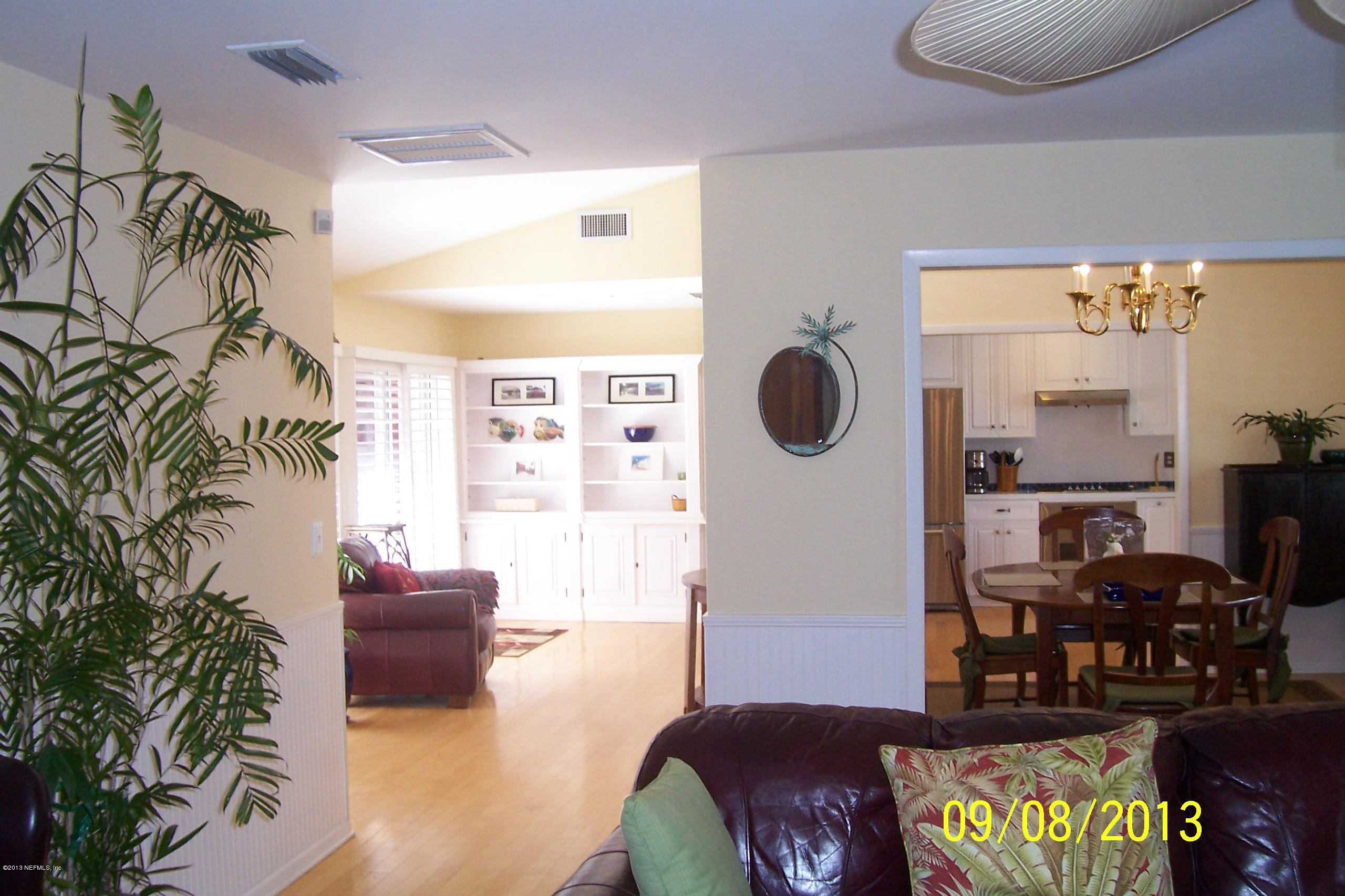 1854 Seminole Road Atlantic Beach, FL 32233 - Photo 24 of 33 a living room with furniture cabinets and a large window