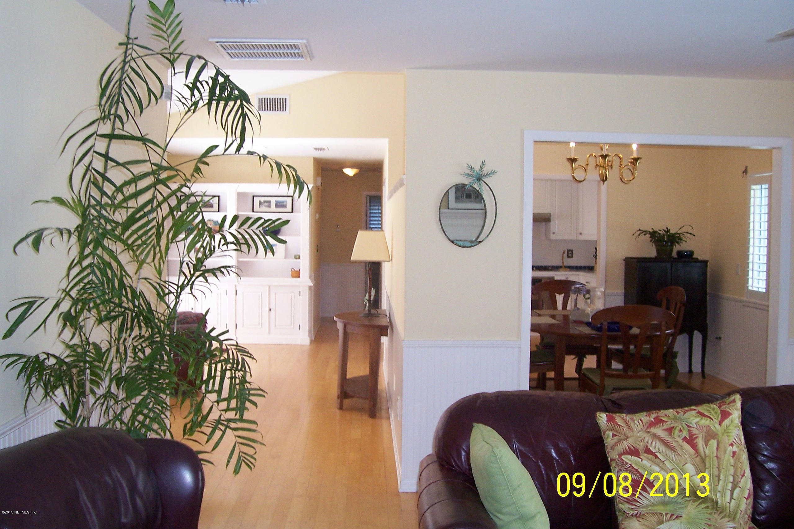 1854 Seminole Road Atlantic Beach, FL 32233 - Photo 4 of 33 a living room with furniture and a potted plant