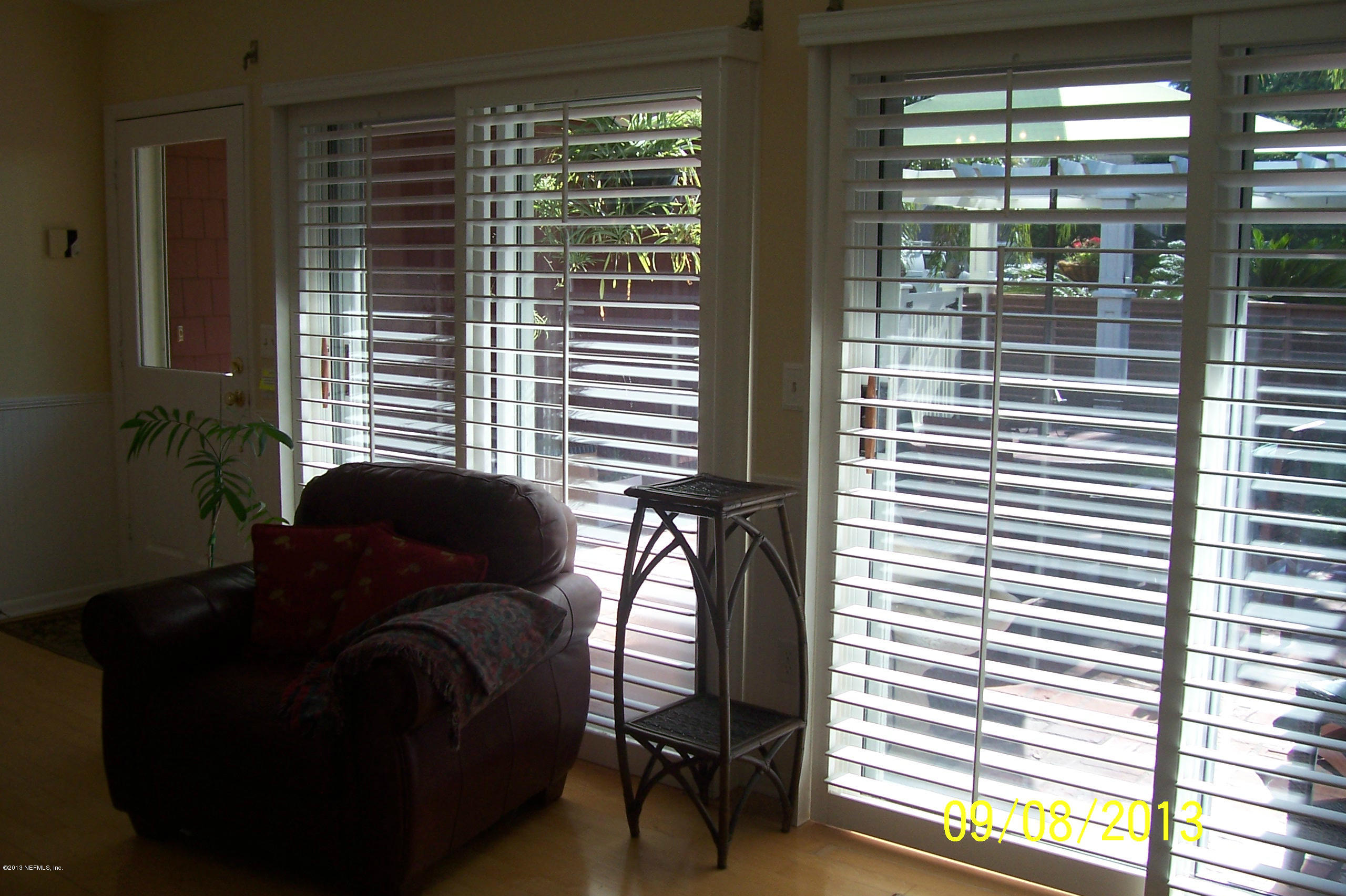 1854 Seminole Road Atlantic Beach, FL 32233 - Photo 5 of 33 a living room with furniture and a window