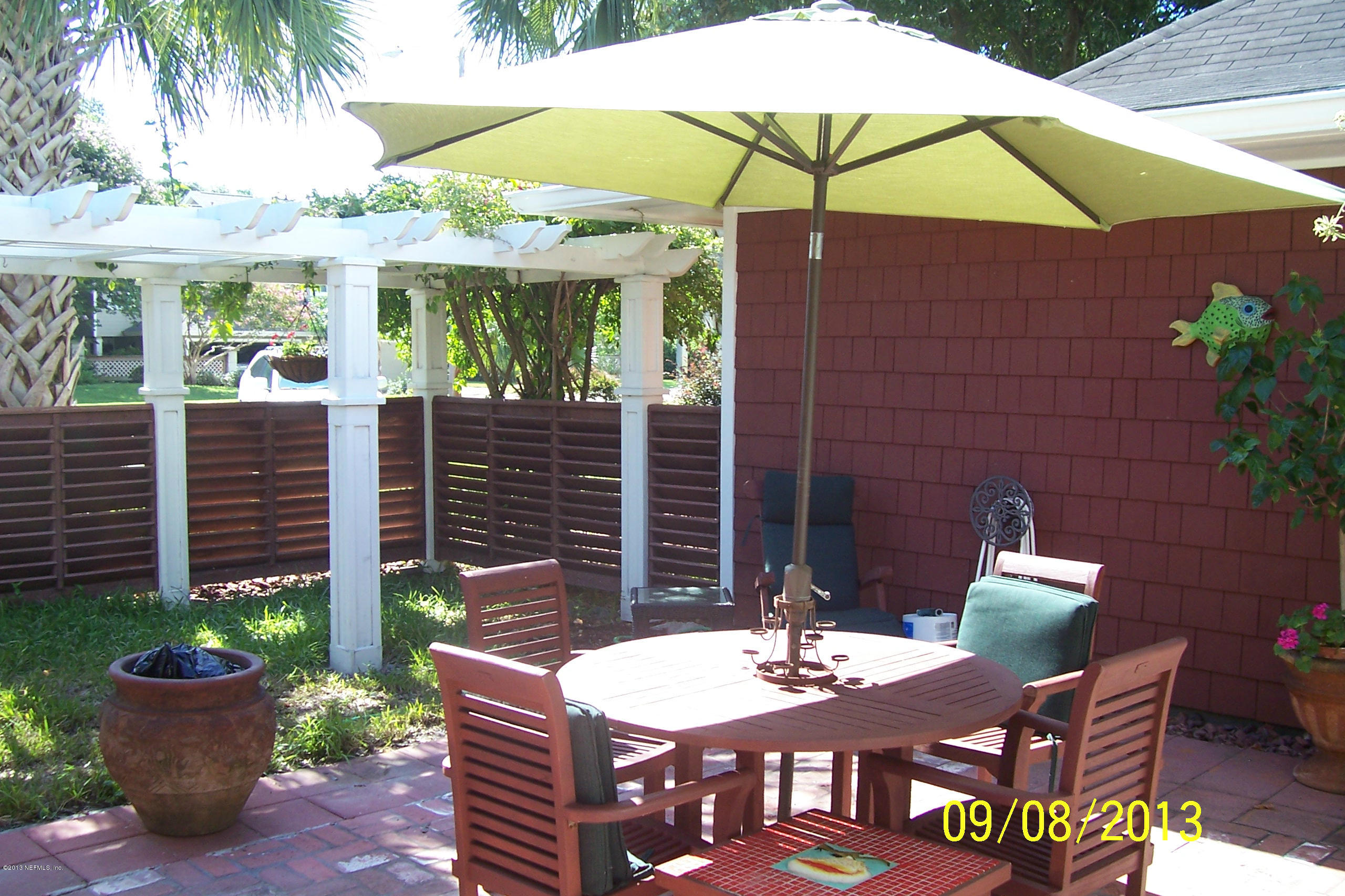 1854 Seminole Road Atlantic Beach, FL 32233 - Photo 7 of 33 a view of an outdoor sitting area with brick walls