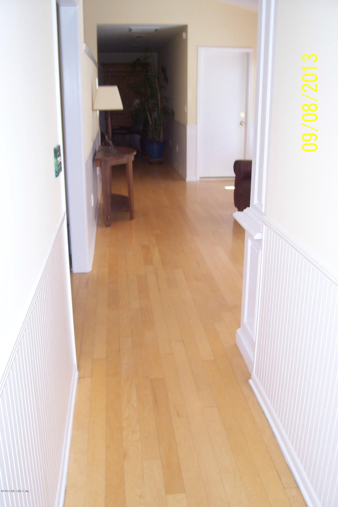 1854 Seminole Road Atlantic Beach, FL 32233 - Photo 9 of 33 a hallway with a view of living room