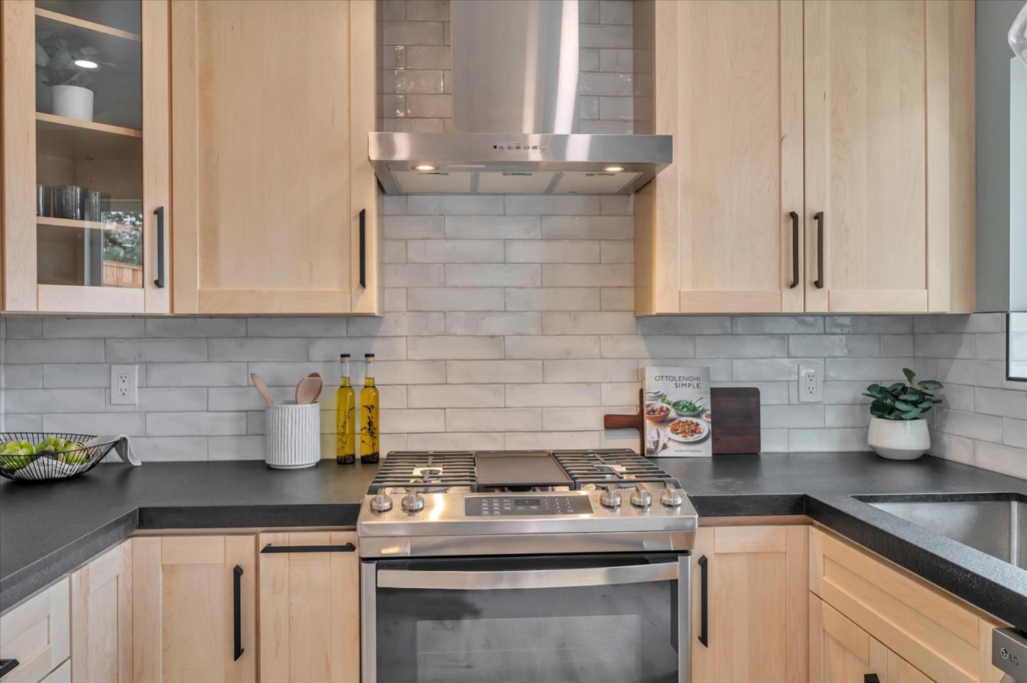 467 Glasgow Drive Pacifica, CA 94044 - Photo 14 of 47 a kitchen with a sink and cabinets