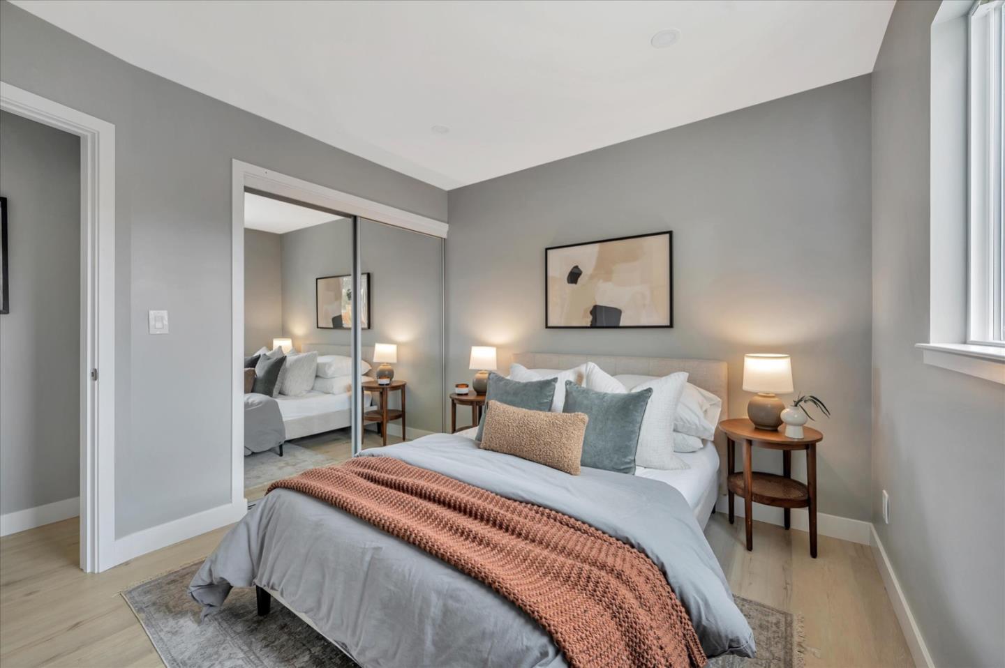 467 Glasgow Drive Pacifica, CA 94044 - Photo 24 of 47 a bedroom with a bed and a lamp