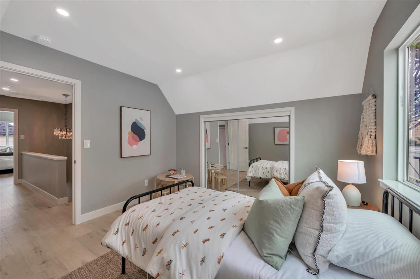 467 Glasgow Drive Pacifica, CA 94044 - Photo 27 of 47 a bedroom with a bed and wooden floor