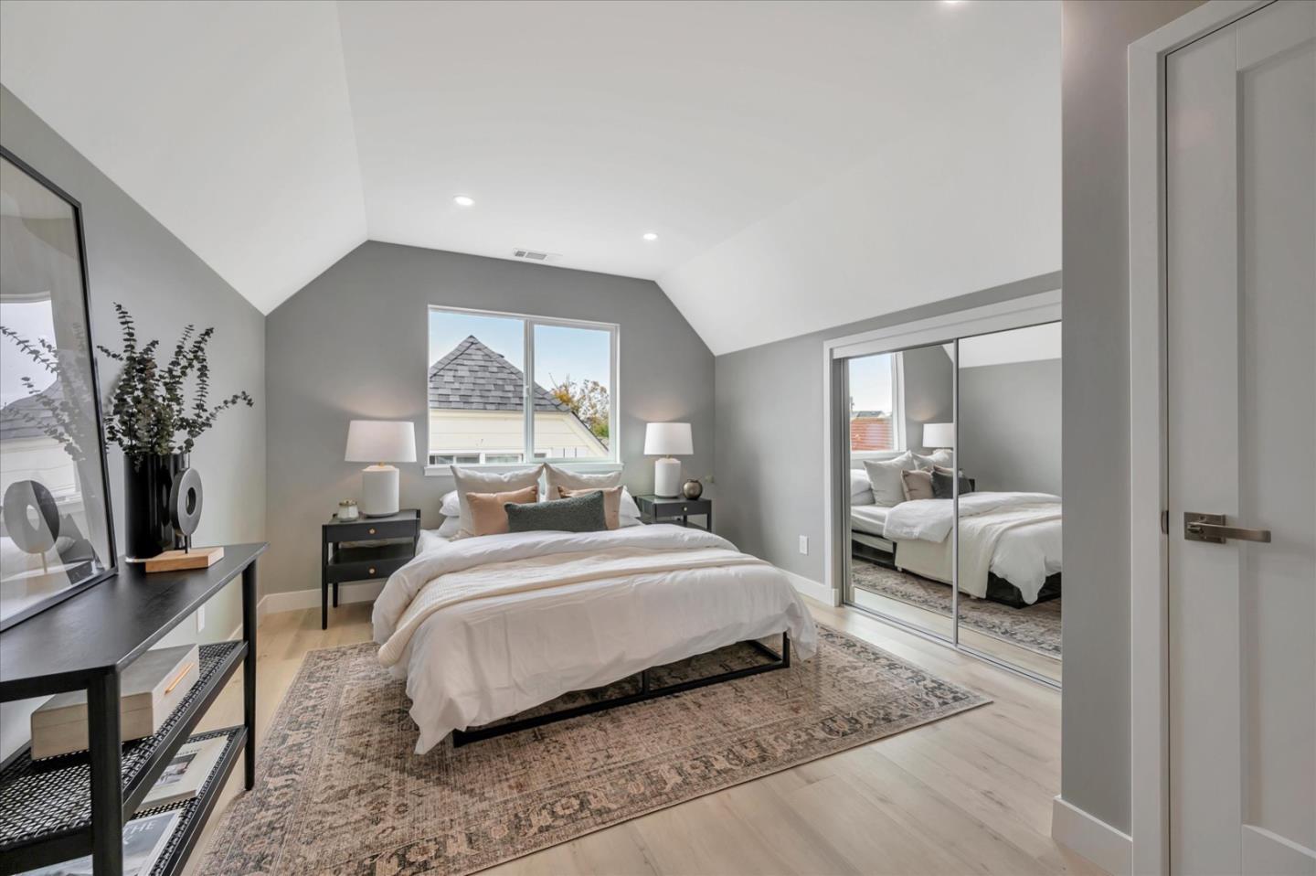 467 Glasgow Drive Pacifica, CA 94044 - Photo 28 of 47 a bedroom with a large bed and a window