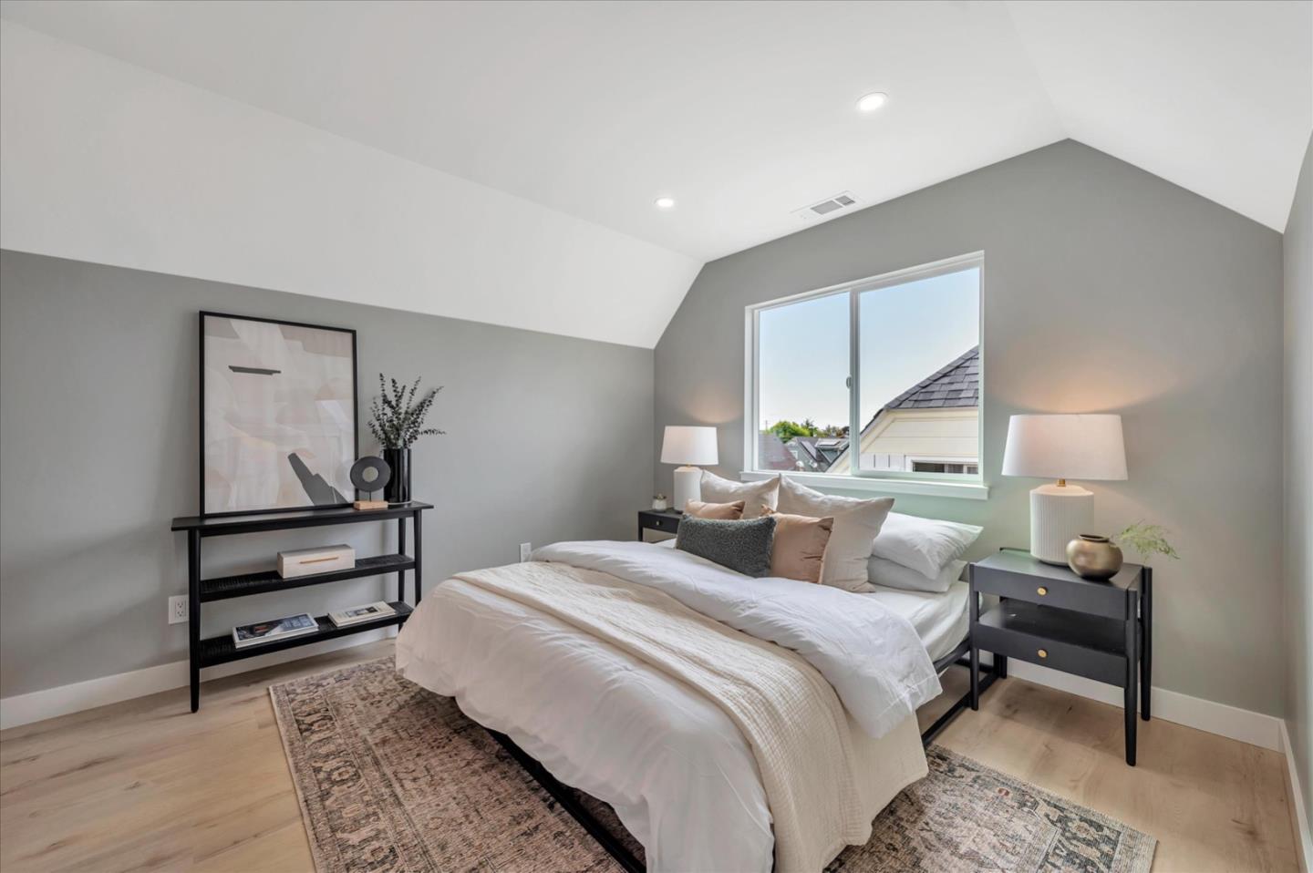 467 Glasgow Drive Pacifica, CA 94044 - Photo 29 of 47 a bedroom with a bed wooden floor and lamp