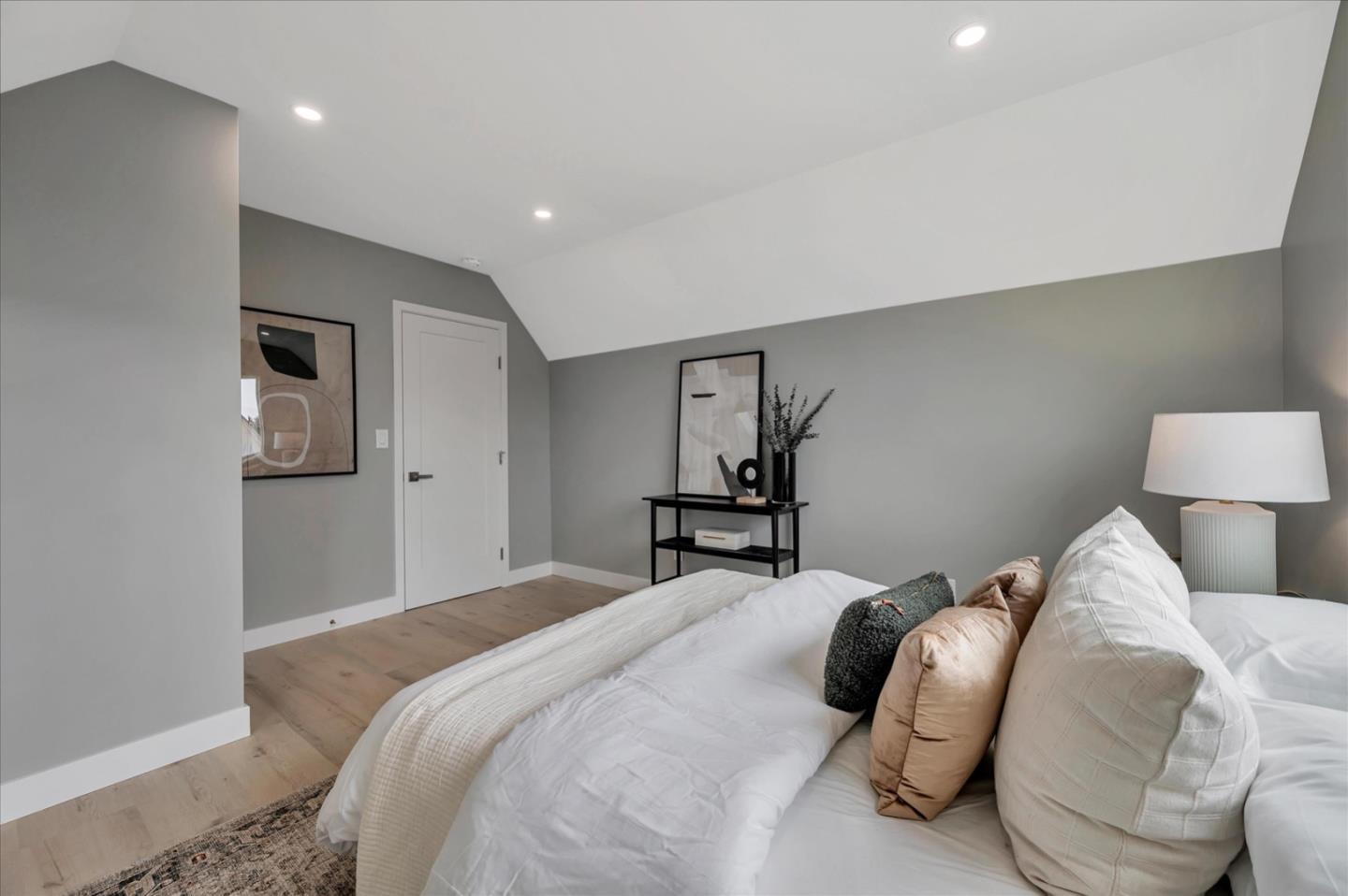 467 Glasgow Drive Pacifica, CA 94044 - Photo 30 of 47 a bedroom with a bed and a lamp