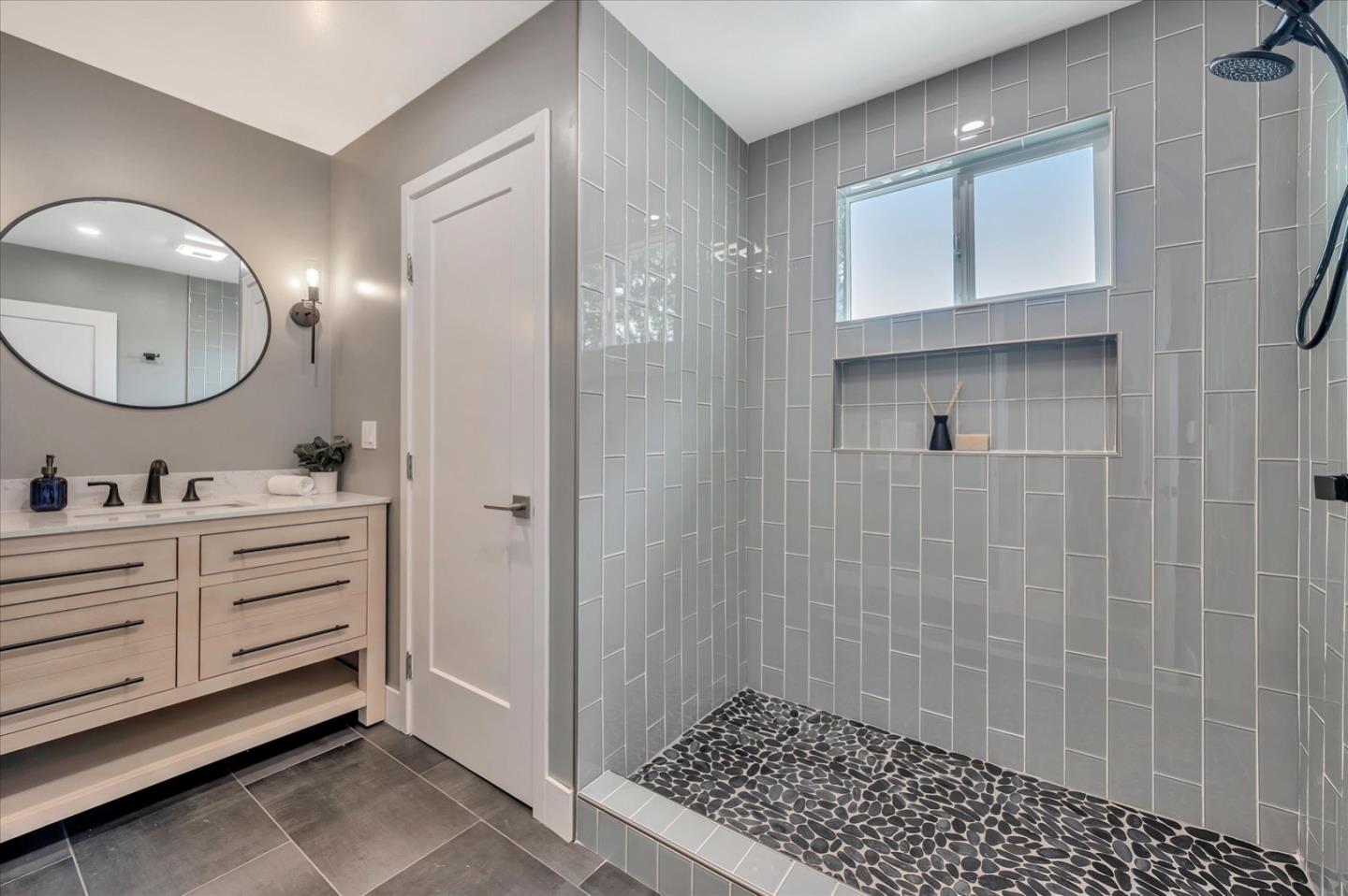 467 Glasgow Drive Pacifica, CA 94044 - Photo 32 of 47 a bathroom with a sink a toilet a shower and a mirror