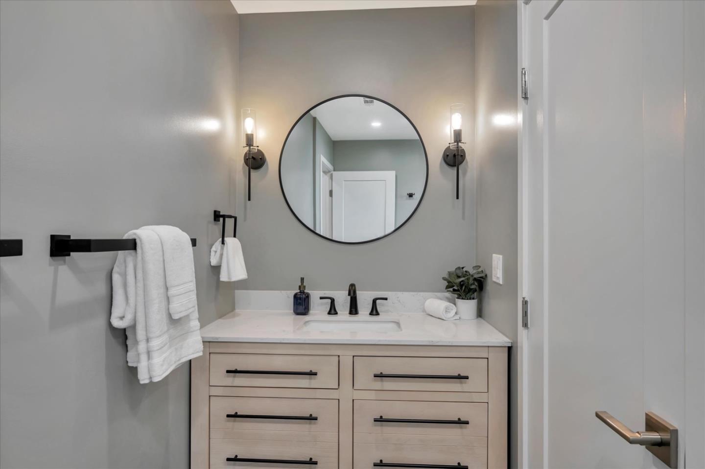 467 Glasgow Drive Pacifica, CA 94044 - Photo 33 of 47 a bathroom with a double vanity sink and a mirror