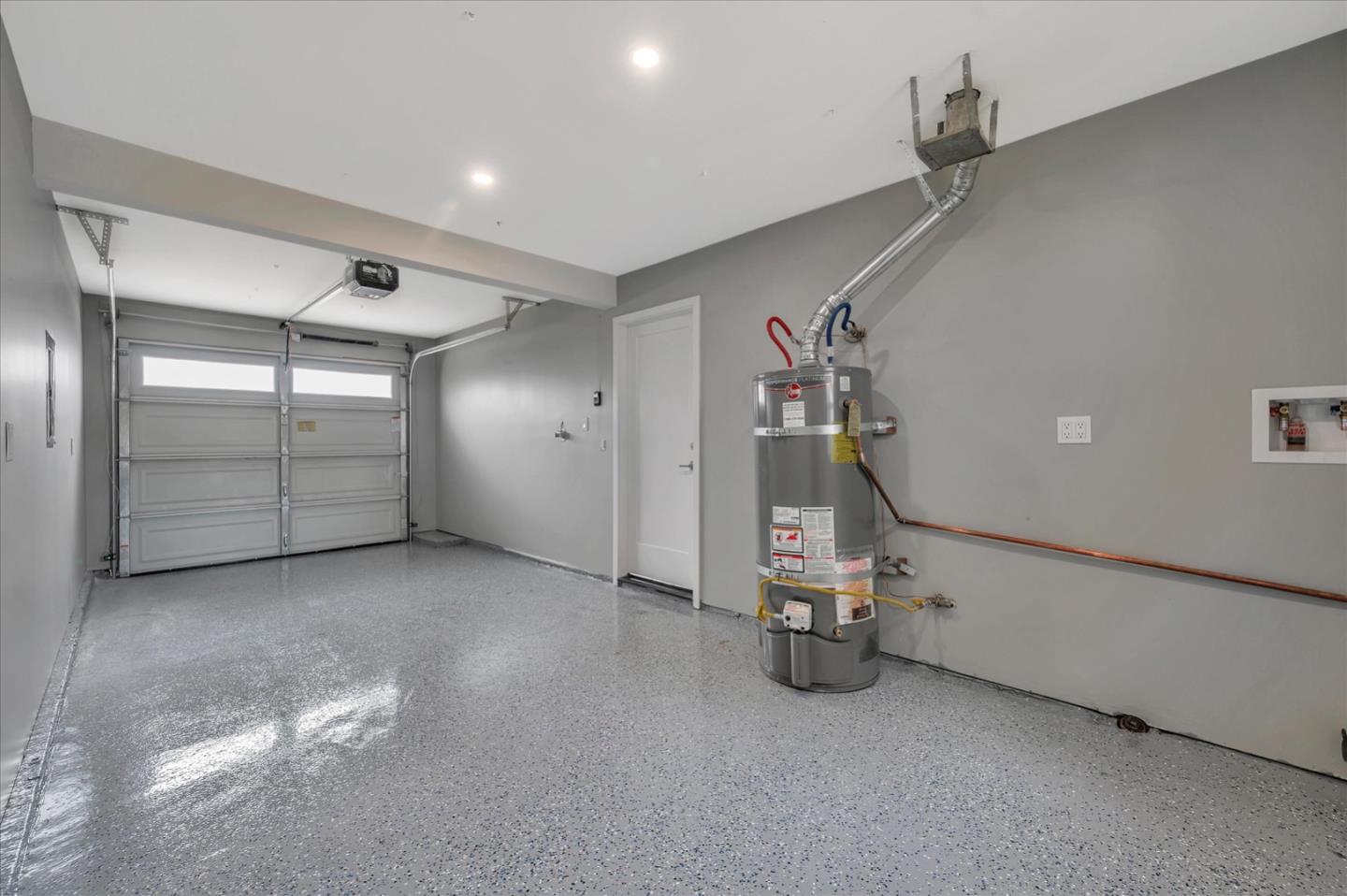 467 Glasgow Drive Pacifica, CA 94044 - Photo 36 of 47 an empty room with gym equipment and windows