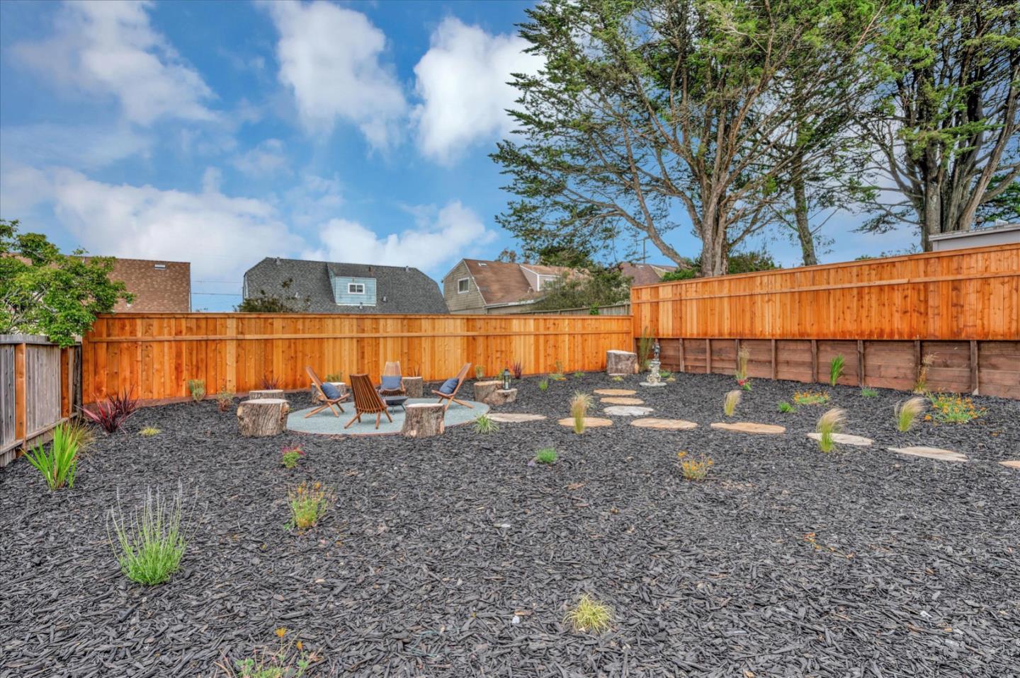 467 Glasgow Drive Pacifica, CA 94044 - Photo 41 of 47 a view of a backyard with wooden fence