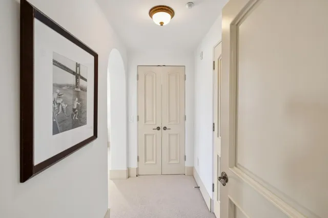a view of a balcony with wooden floor